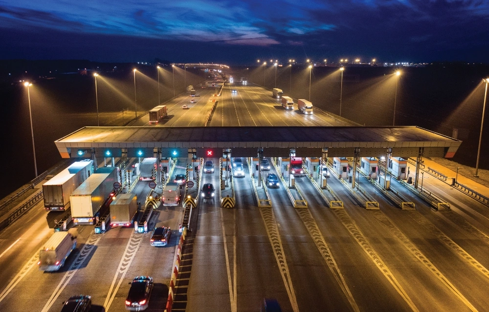Electronic toll plaza operating across multiple lanes at night