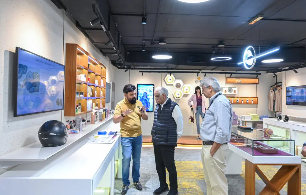 Dr. Ram Charan during a guided technology walkthrough at i-TEK’s PanchaJanya Experience Centre in Pune.