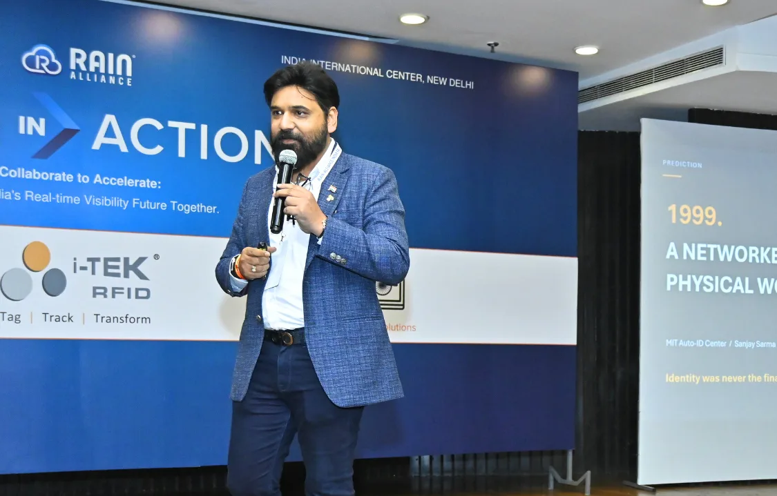 Ashim Ashok Patil addressing RAIN in Action 2026 on collaboration and India’s real-time visibility ecosystem.